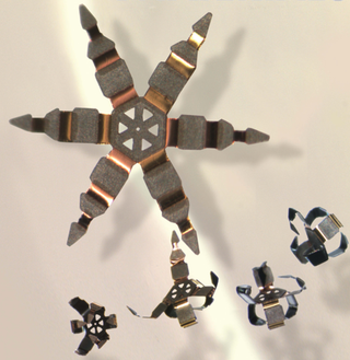 Illustration for article titled Swarm of microgrippers inserted where.. ?